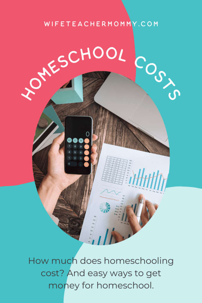 desk covered with papers with charts on them and a cell phone calculator- homeschool costs